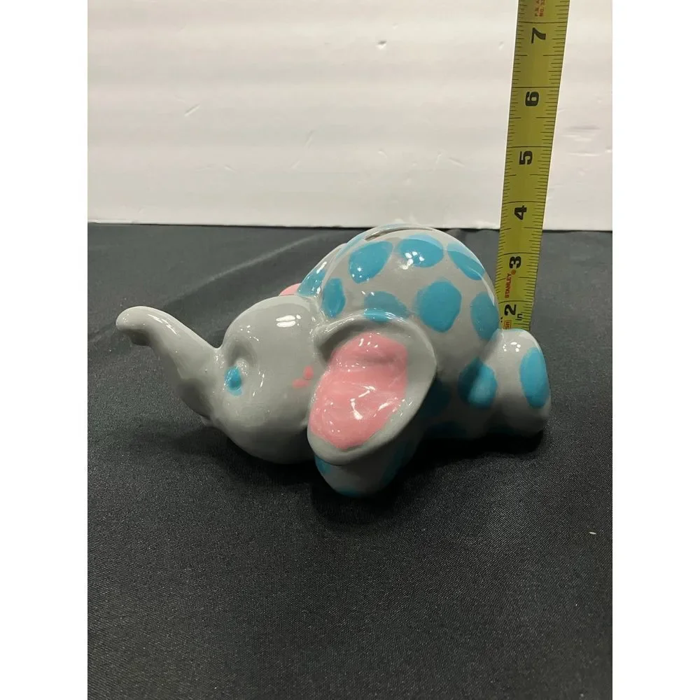 Vintage Elephant piggy bank. Gray with blue dots‎